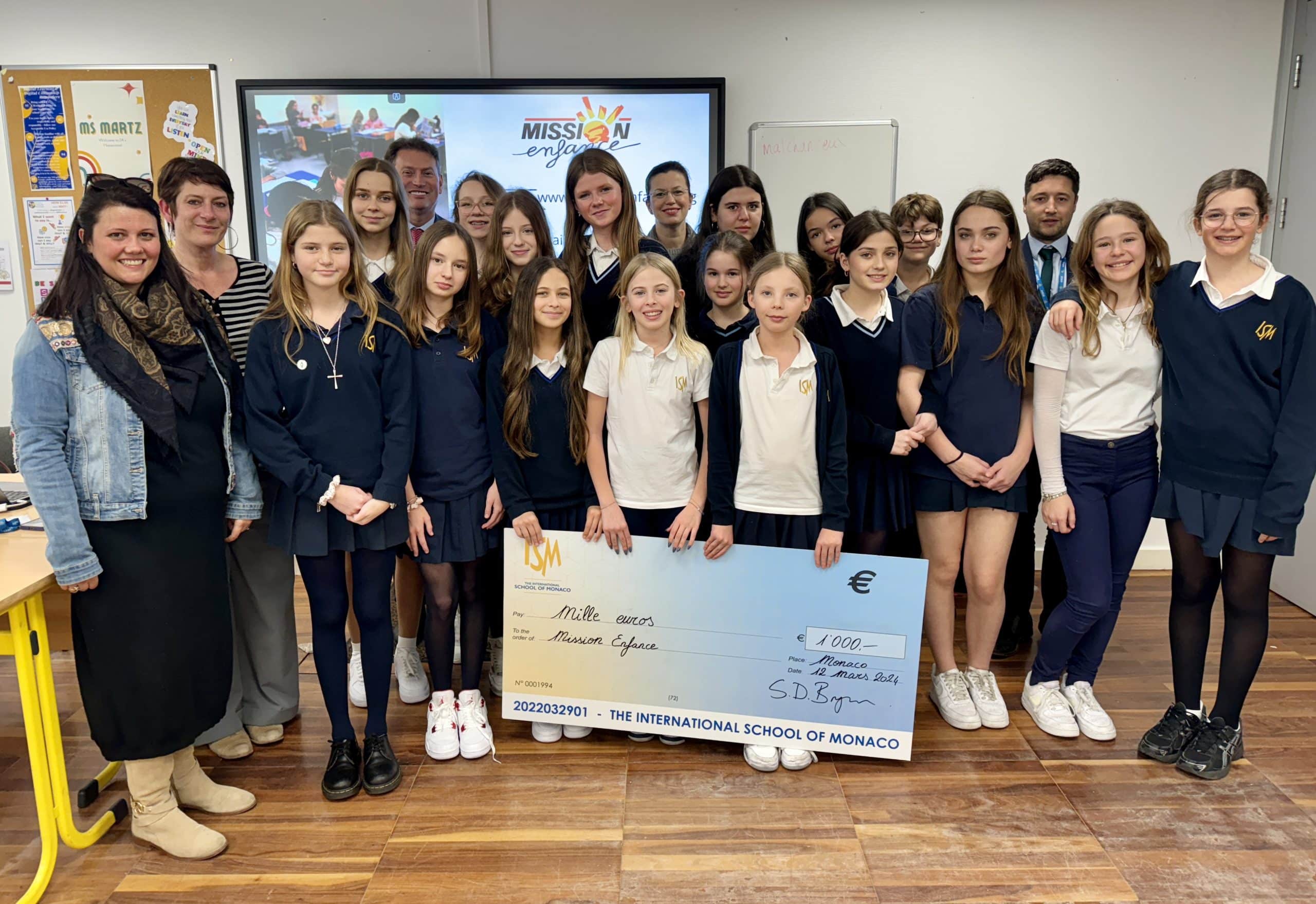Philanthropy Club & PTA support children with donation to Mission Enfance Image